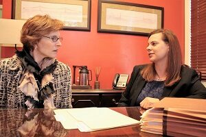 Attorney Beverly Snelgrove speaking with a client