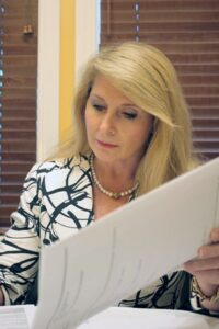 Natalie Bluestein reading through legal papers